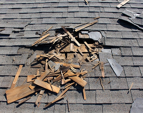 damaged roof needs repairs